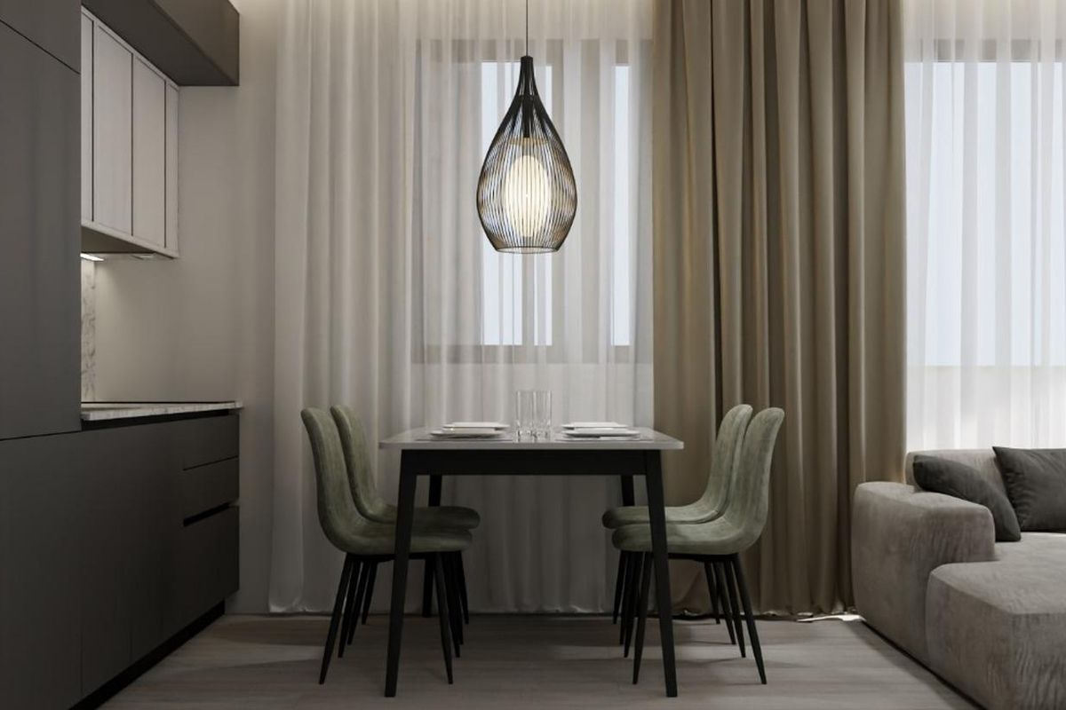 Eetgebied met elegante verlichting in het appartement met 1 slaapkamer, perfect voor maaltijden in Torrevieja, Costa Blanca.