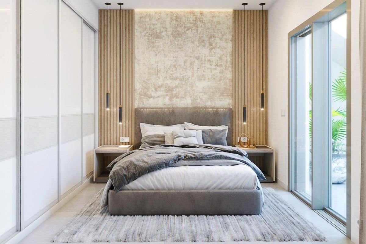 Gezellige slaapkamer in een twee-slaapkamer townhouse in Pilar de La Horadada, elegant gestyled met natuurlijk licht.