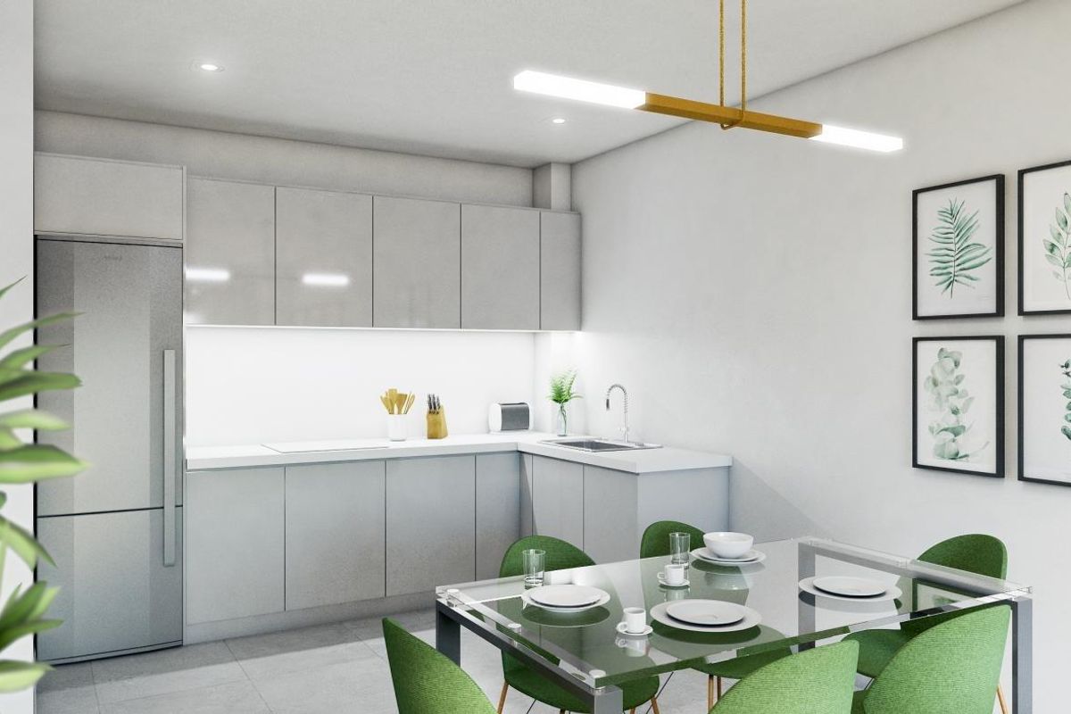 Moderne keukenontwerp met stijlvolle kasten en eetruimte in een penthouse in Fuengirola, Costa del Sol.