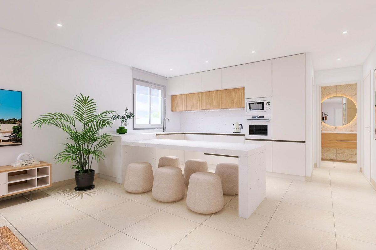 Een ander perspectief van de stijlvolle keuken in de 4-slaapkamer bungalow in Bigastro, die de functionele indeling onthult.