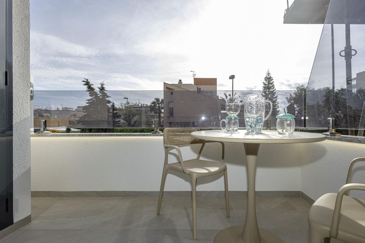 View of communal pool from apartment terrace