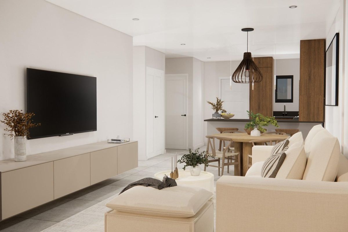 Lichte open leefruimte en eetkamer van appartement in Costa Blanca met moderne wit-houten inrichting