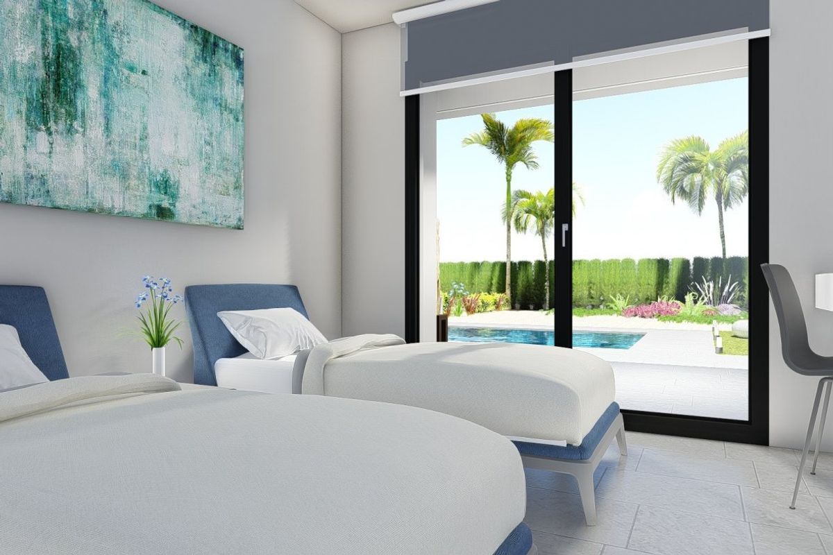 Charming twin bedroom in a 2-bed villa in Calasparra, with a view of the pool and garden.