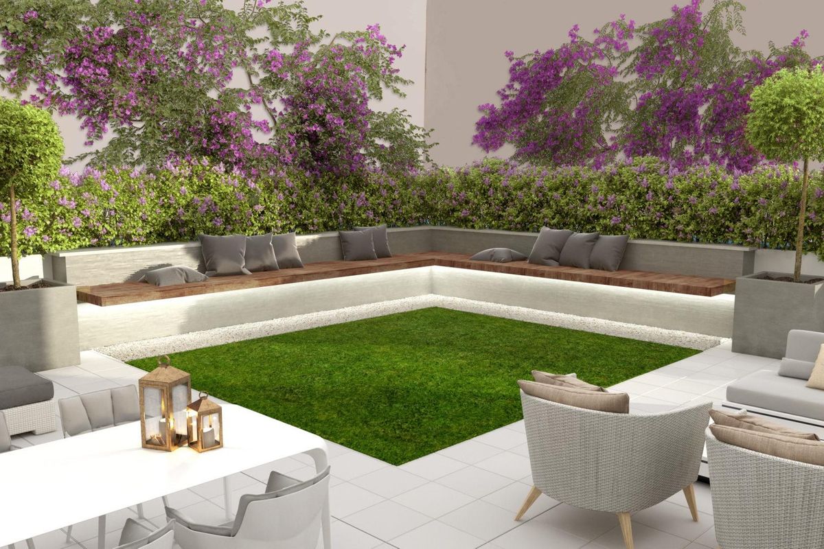 Stijlvol terras met zitplaatsen en groen in een 1-slaapkamer appartement in Málaga, Costa del Sol.