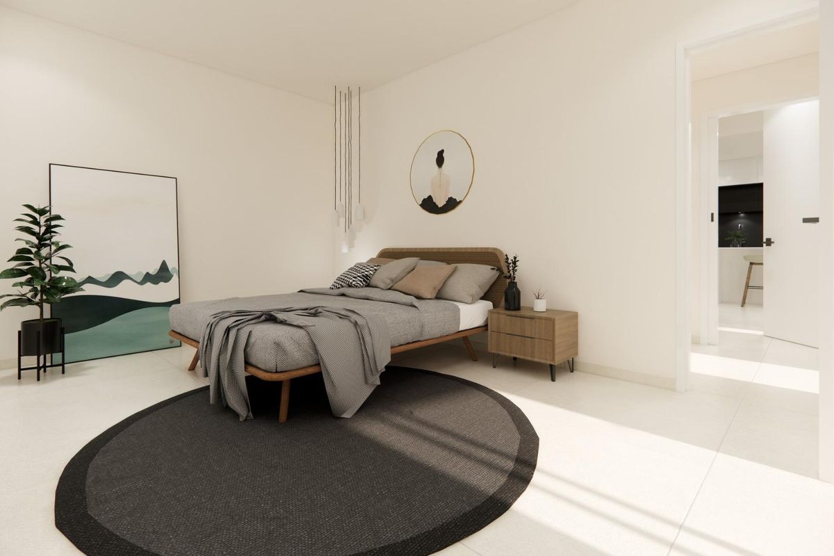 Charmante slaapkamer in een bungalow, met stijlvolle decoratie en natuurlijk licht in Dolores, Spanje.