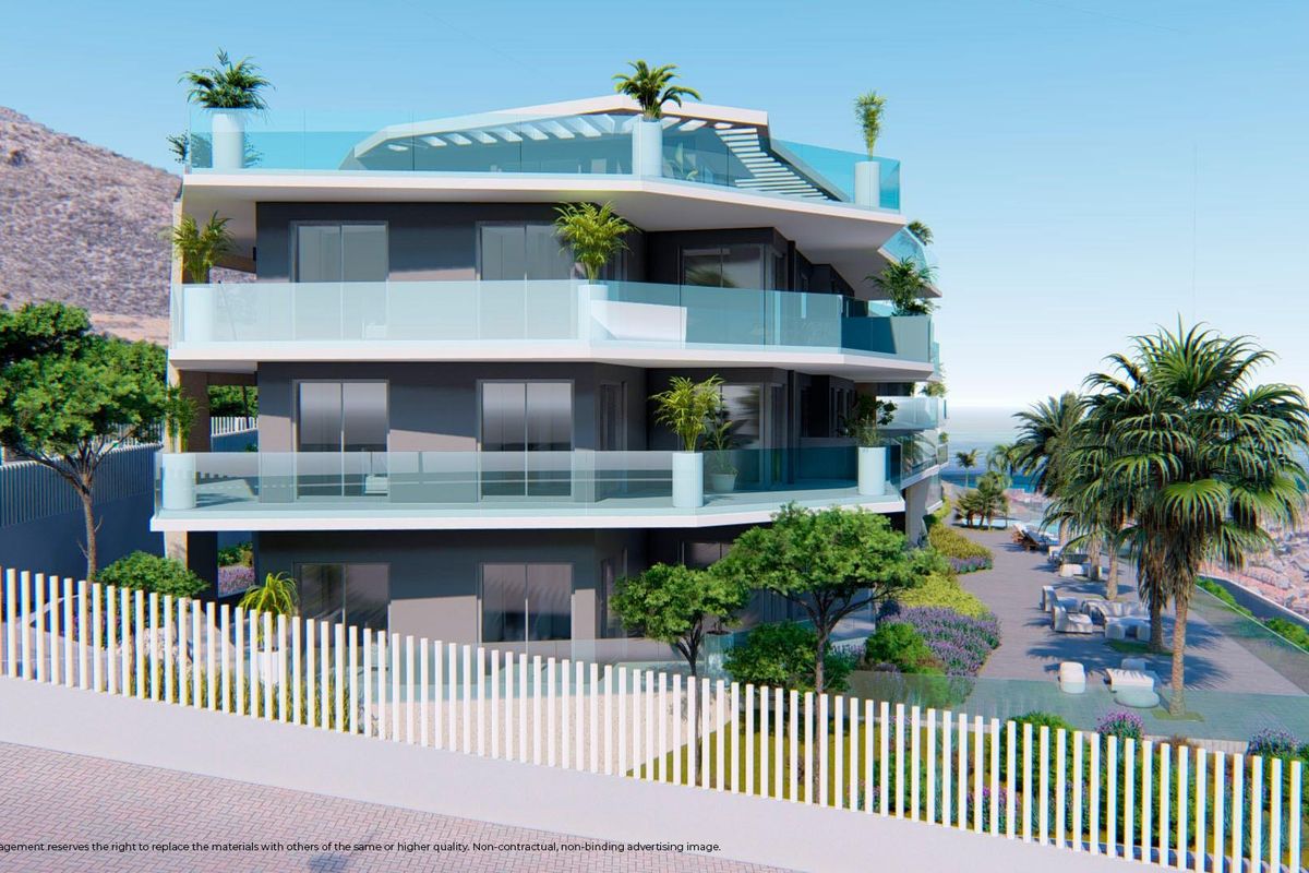 Architectonisch exterieur van een nieuw 3-slaapkamer penthouse in Benalmádena, met weelderige beplanting.
