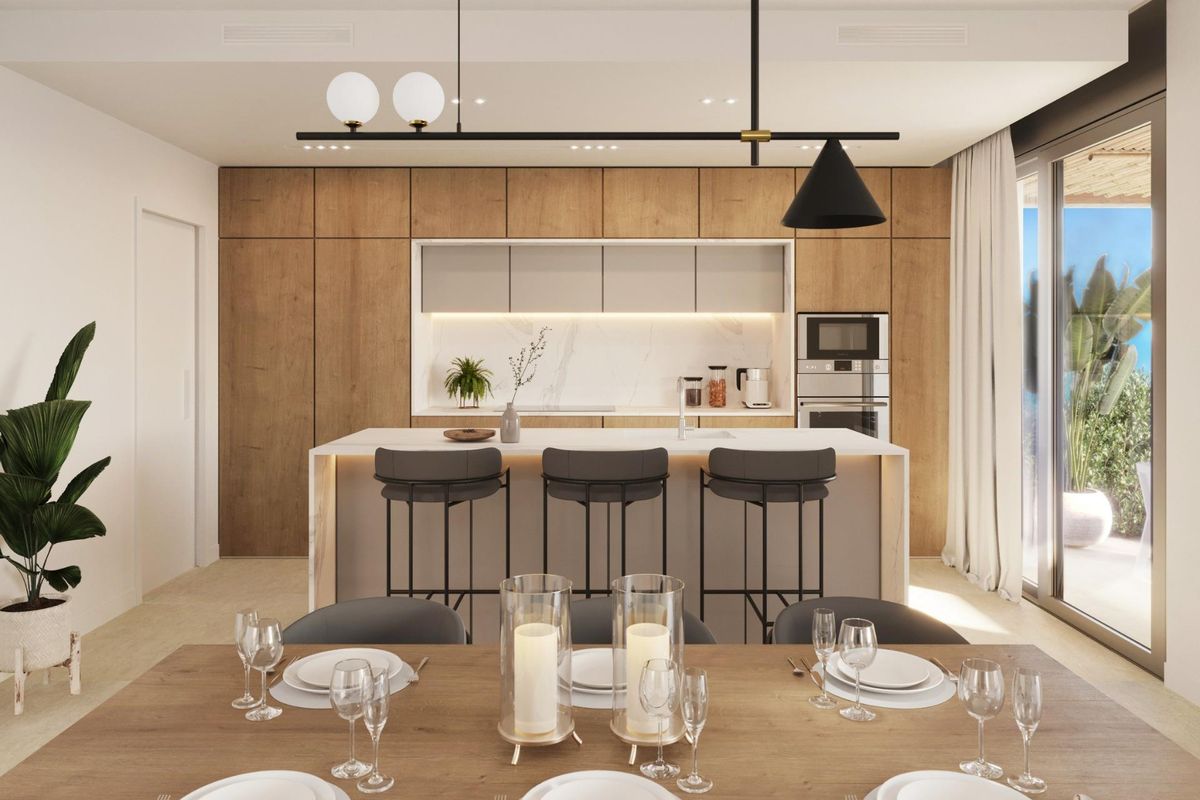 Chique keuken in een moderne villa in Polop, benadrukt door elegante armaturen en een ruime indeling.