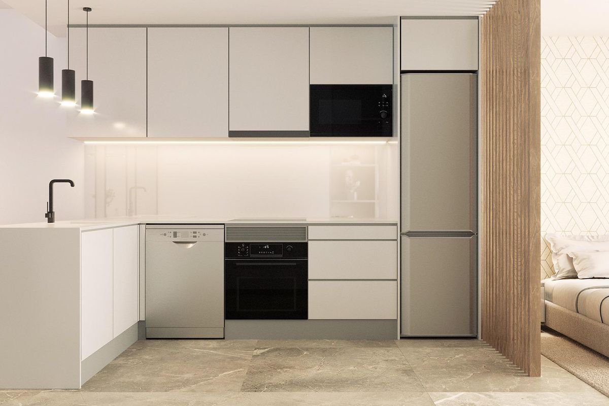Contemporary keukenontwerp in het 1-slaapkamer appartement in Torrevieja, met functionele apparaten en opslag.