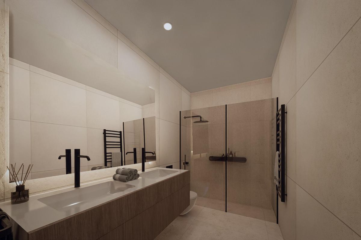 Strak badkamerontwerp in een 2-slaapkamer appartement in Calpe, met moderne armaturen en een ruime indeling.