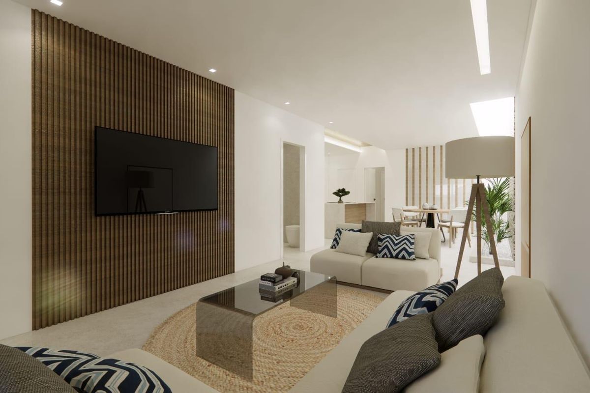 Gezellige woonkamer in het appartement, met een stijlvolle bank en wand-tv in Catral.