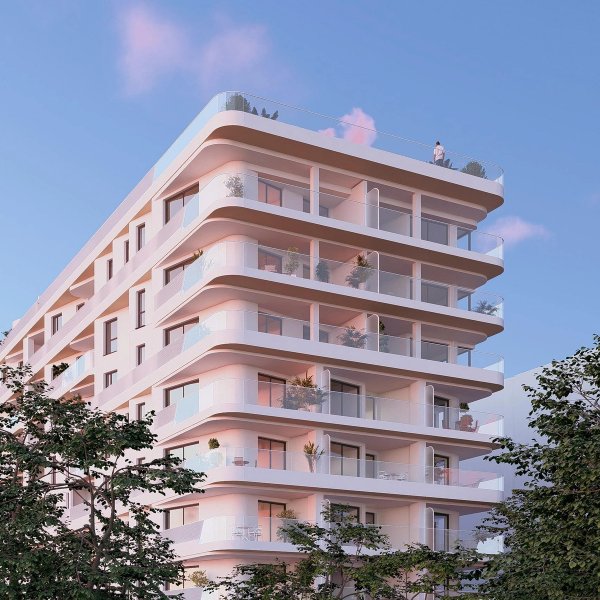 Modern appartementengebouw met 2 slaapkamers in Villajoyosa, met meerdere balkons en een eigentijds ontwerp.