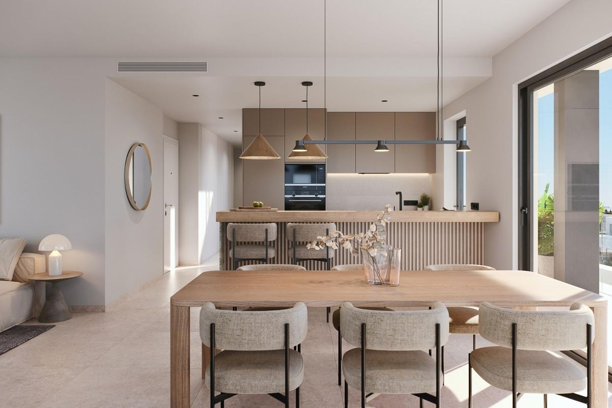 Moderne keuken en eetruimte in het penthouse, met strakke apparaten in Torre Pacheco.