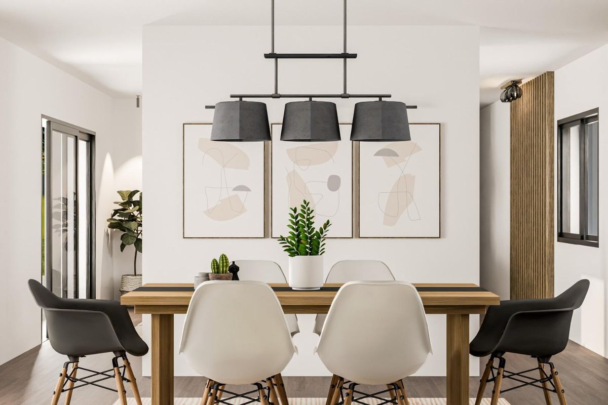 Dining space in a modern villa in Pinoso, showcasing a polished table set for casual gatherings.