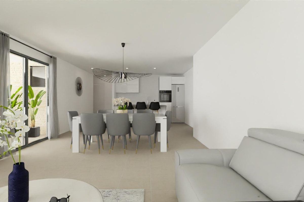 Bright and spacious living room and dining area in a 3-bed villa in Monforte del Cid, Costa Blanca South.