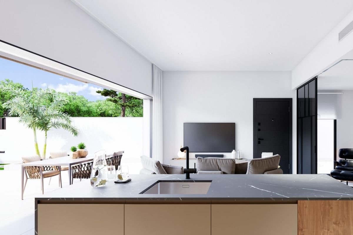 Uitnodigend keukenoverzicht dat opent naar een patio, wat een buitengevoel brengt in een 3-slaapkamer huis in Pilar de La Horadada.