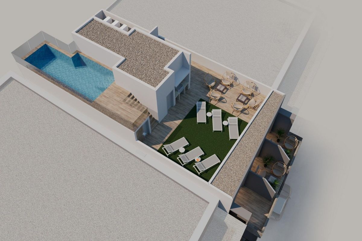Communal rooftop pool and sunbathing area