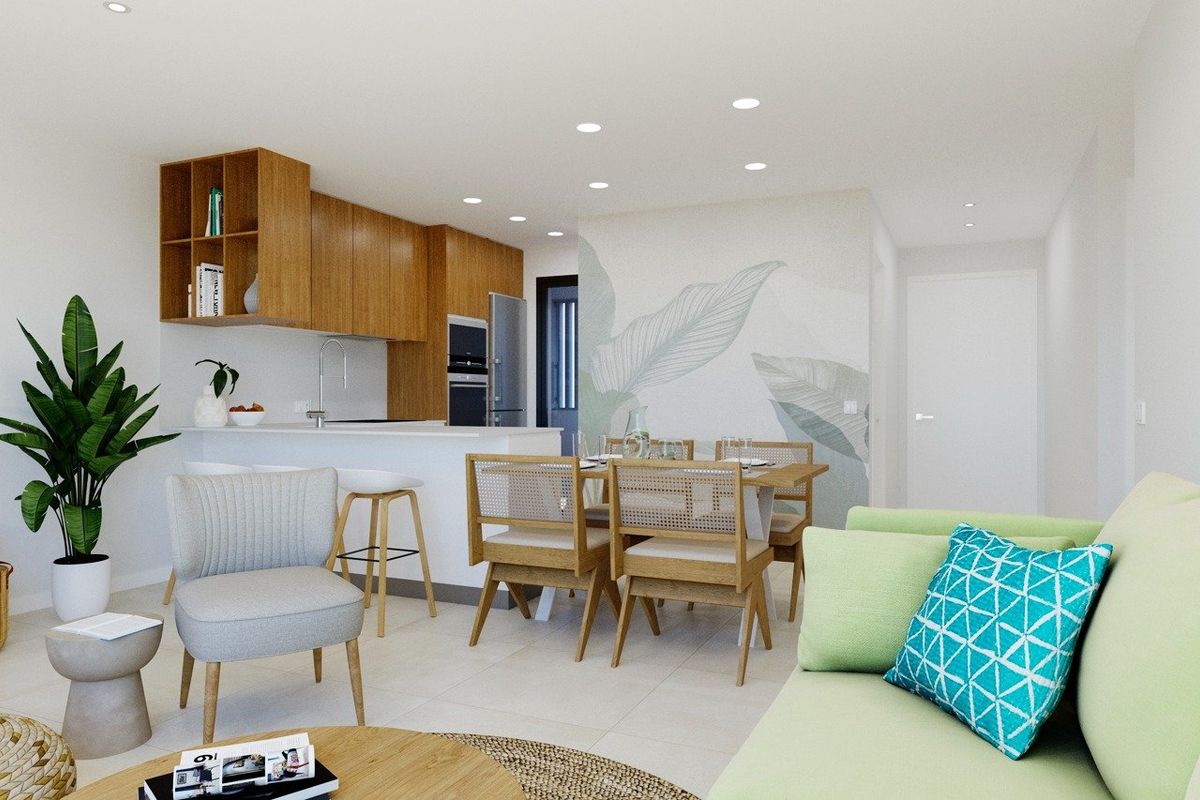 Stijlvolle woonkamer en keuken in een bungalow, met moderne meubels en een gezellige sfeer.