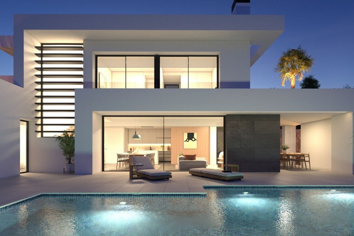 Stijlvolle avondweergave van de 3-slaapkamer villa in Benitachell, met buitenzitplekken en zwembad.