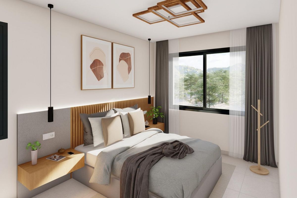 Gezellige slaapkamer met een stijlvol ontwerp, met een tweepersoonsbed en uitzicht op de bergen in een villa in Yecla.