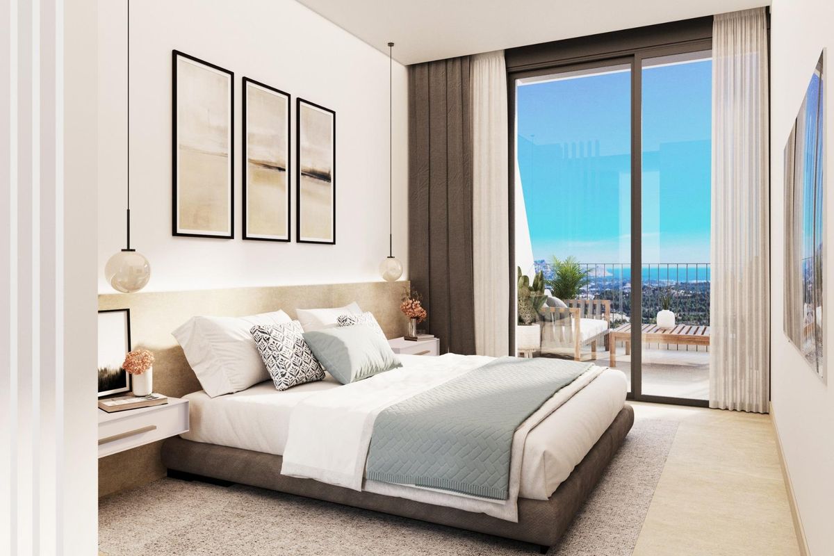 Elegant slaapkamer met moderne esthetiek en uitzicht in een 3-slaapkamer villa in Polop, Costa Blanca Noord.