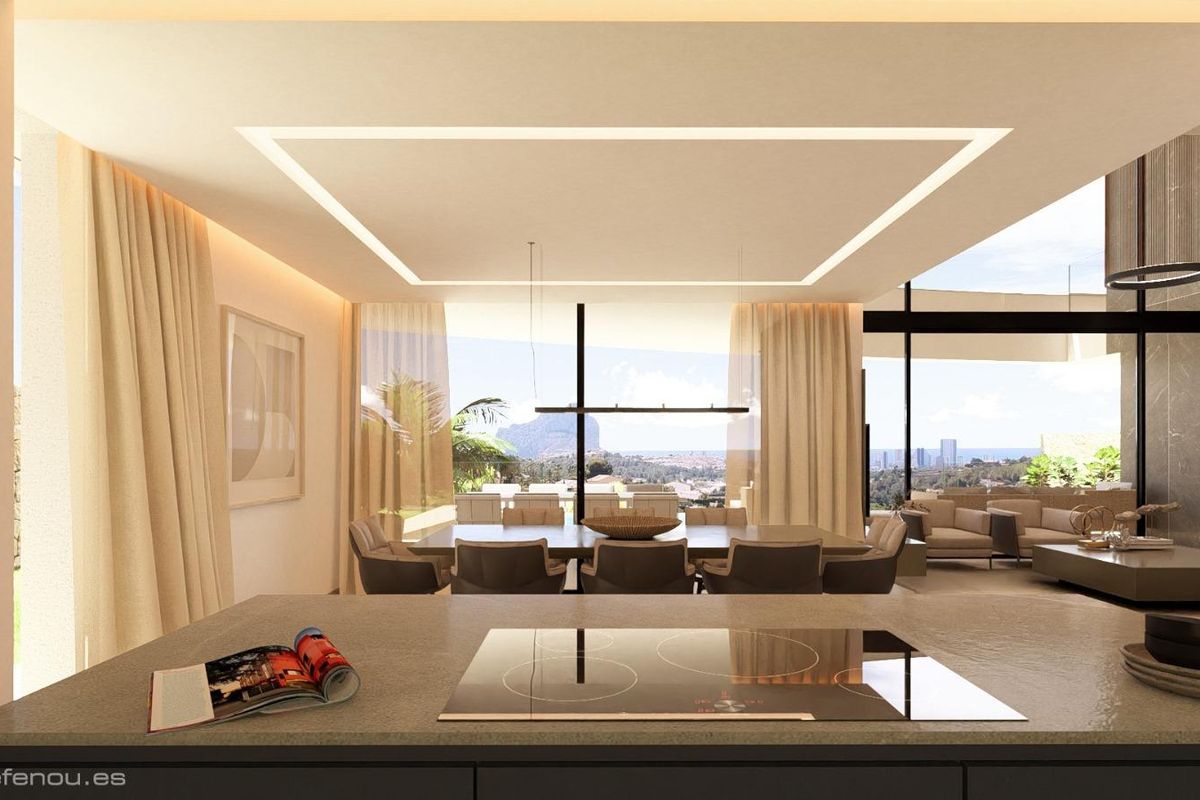 Moderne keuken in de villa met hoogwaardige apparaten en een open indeling, met uitzicht op de eetruimte in Calpe.