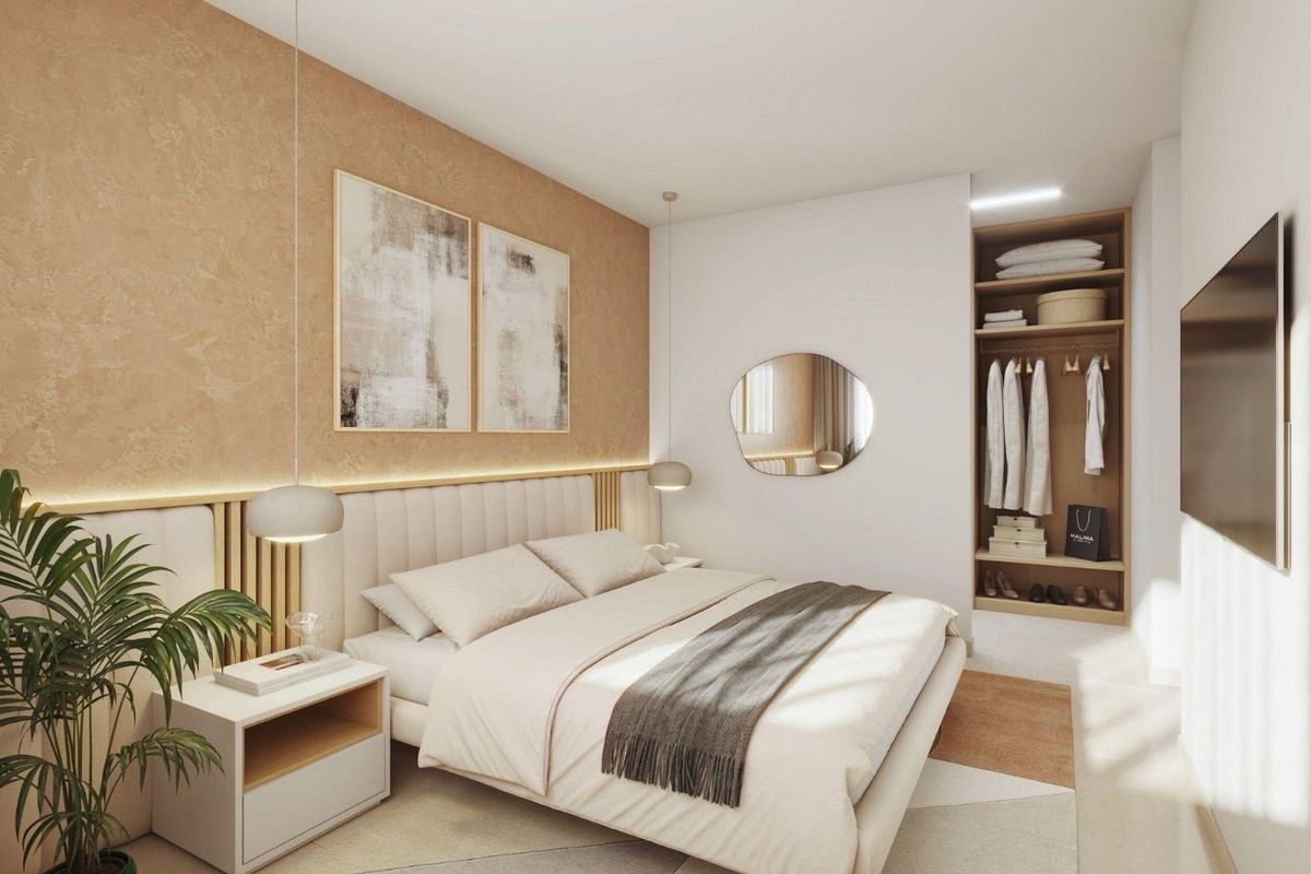 Bedroom in 3-bed villa, Costa Calida, Spain. Warm color palette, minimalist design, and built-in wardrobe.
