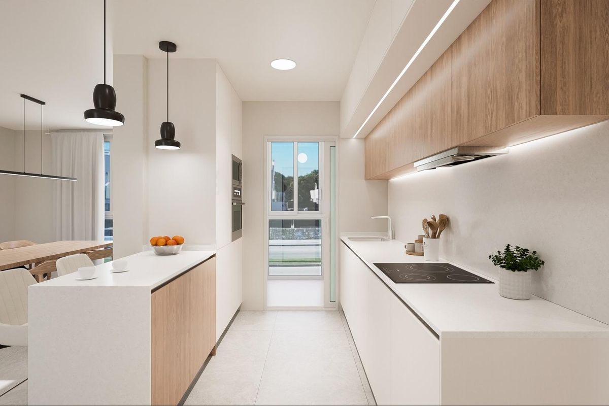 Strakke keuken met moderne apparaten en een minimalistisch design in een 2-slaapkamer appartement in Pilar de La Horadada.