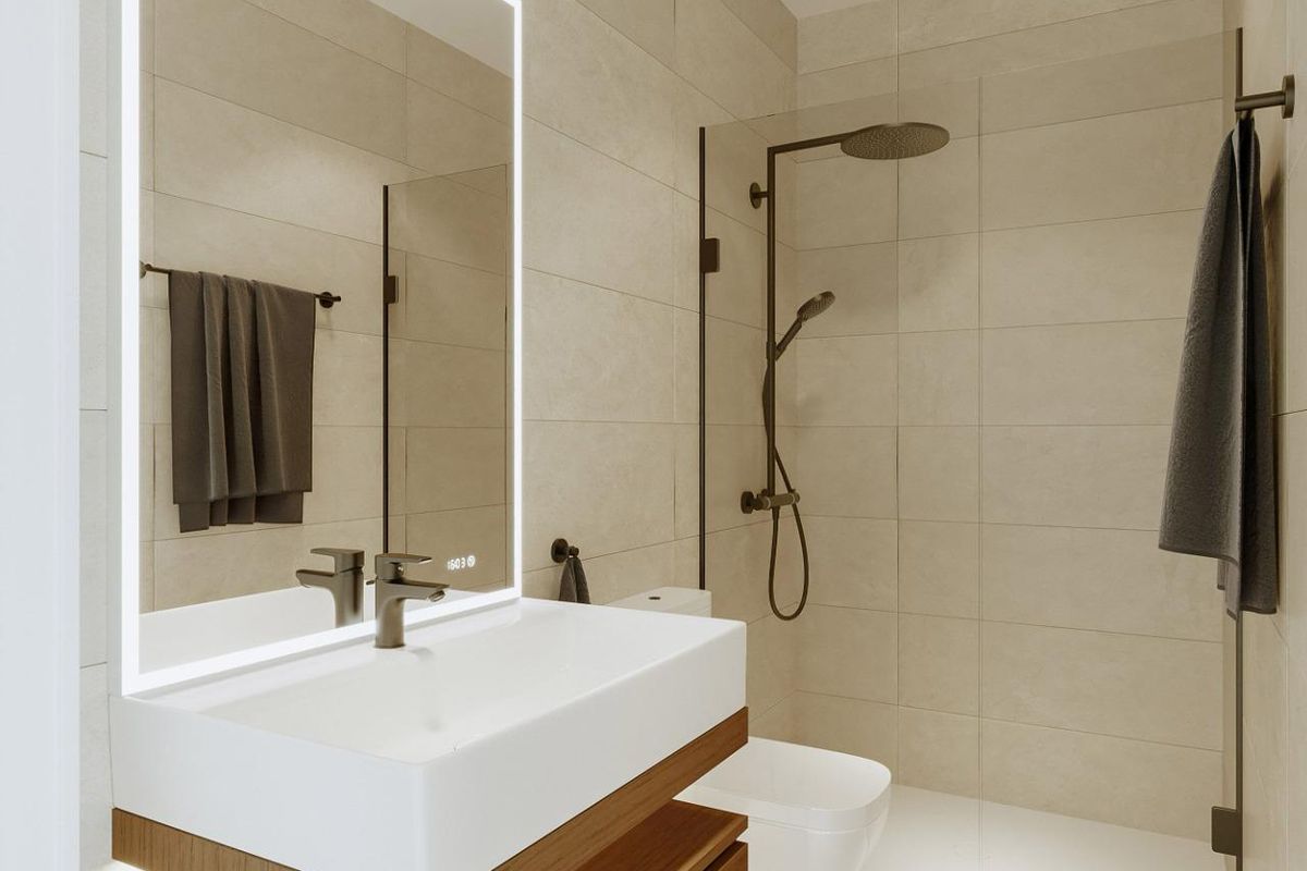 Modern badkamer in een townhouse in Fuengirola, met een strakke indeling en ontwerp.