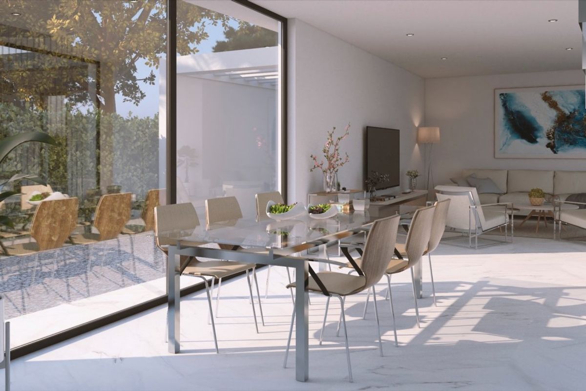 Inviting dining space in a 4-bed villa in Baños y Mendigo, with modern furnishings and garden access.