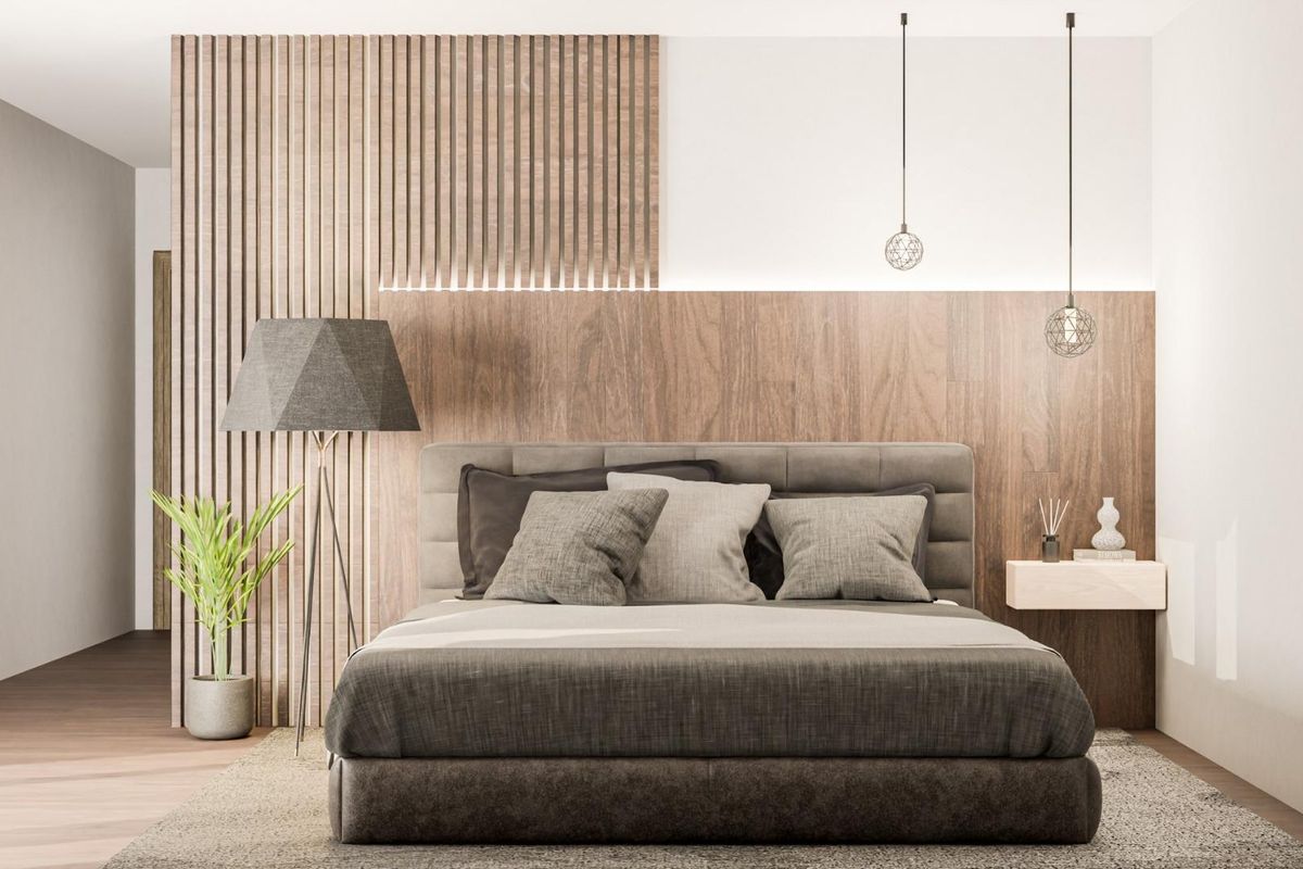 Stylish bedroom featuring a wooden headboard and tranquil ambiance, within a 3-bed villa in Pinoso, Costa Blanca.