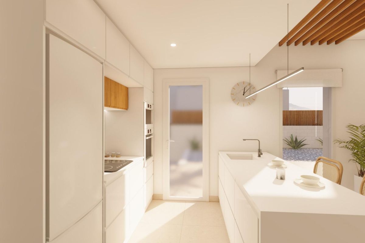 Moderne keuken in een 3-slaapkamer villa met strak ontwerp en natuurlijk licht in Pilar de La Horadada, Spanje.