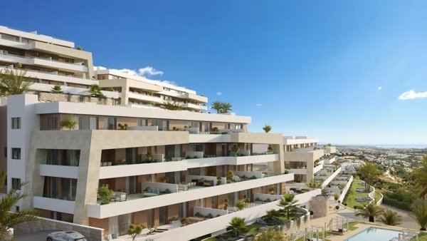 Buitenzicht op een moderne appartementengebouw met 3 slaapkamers in Estepona, met uitzicht op de Costa del Sol.