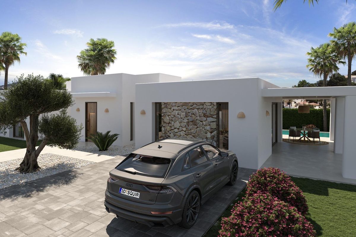 Vooraanzicht van een moderne villa in Jávea, Costa Blanca Noord, met aangelegde tuinen en een parkeerplaats.