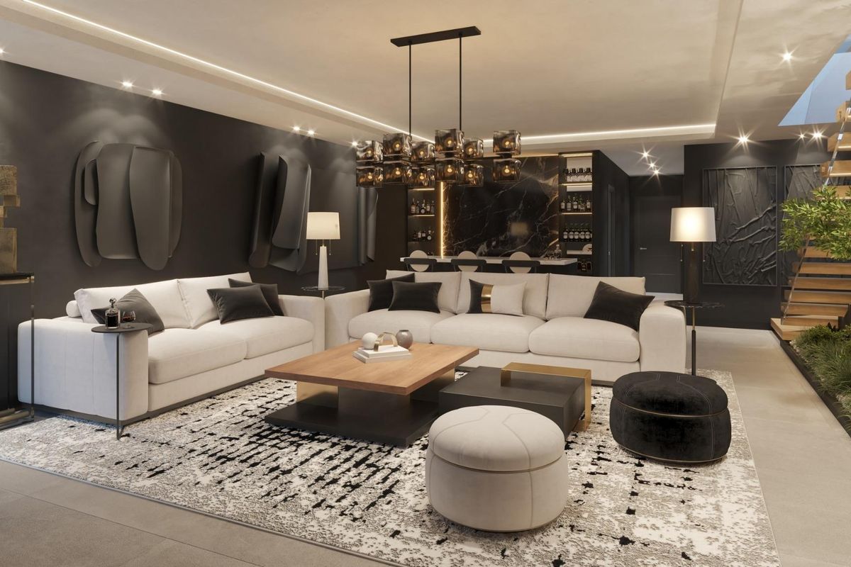 Chique woonkamer met moderne ontwerpelementen en gezellige zitplaatsen in een villa in Benalmádena.