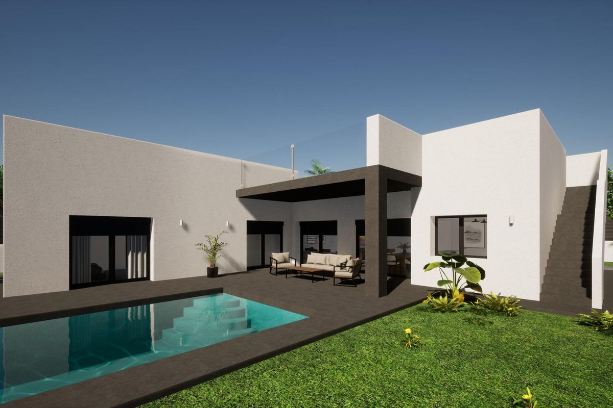 Modern 3-bed villa in Pinoso with a swimming pool and terrace, surrounded by a beautiful garden.