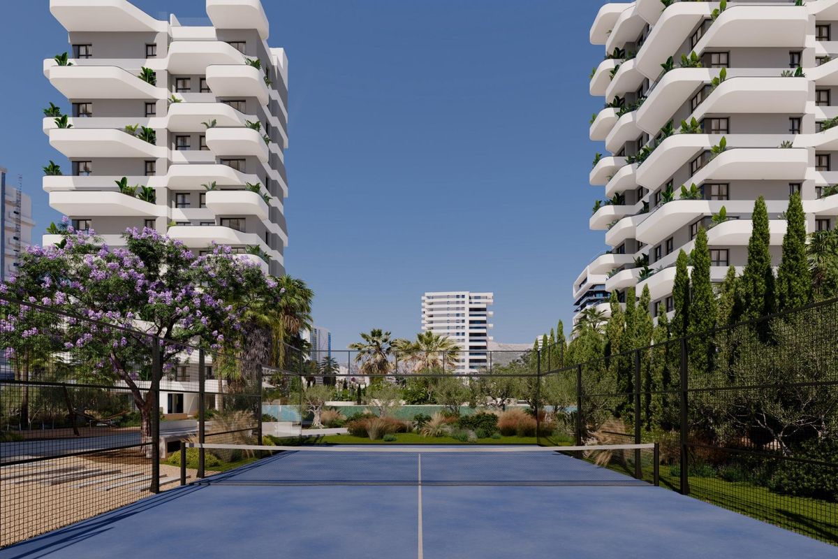 Tennis court available in a modern apartment complex surrounded by greenery in Calpe, Costa Blanca North.