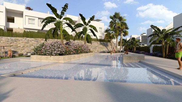 Palm-lined pool area with spacious water features in Algorfa, Costa Blanca South, Spain.