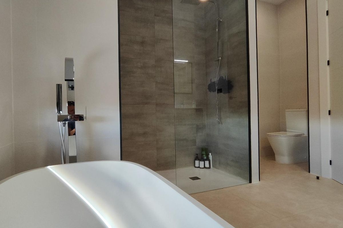 Stylish bathroom featuring a glass shower and contemporary design in a Pinoso villa, Costa Blanca South.