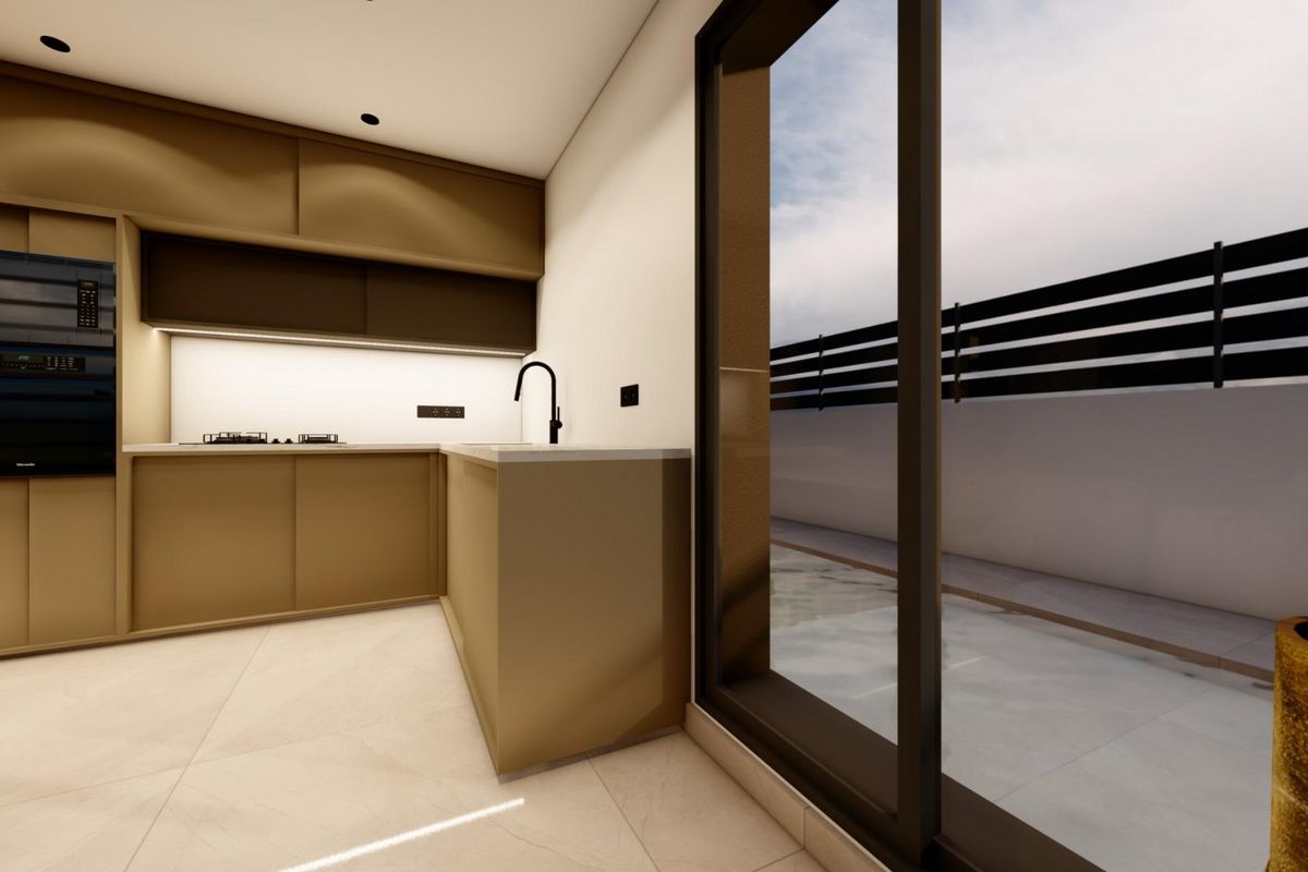 Interieur van een moderne keuken in een villa in Benijofar, met strakke kasten en natuurlijk licht.