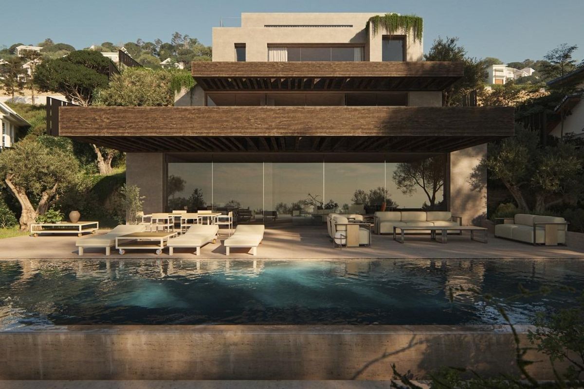 Het exterieur van de villa met het zwembad en hedendaagse architectuur, gelegen in Benissa.