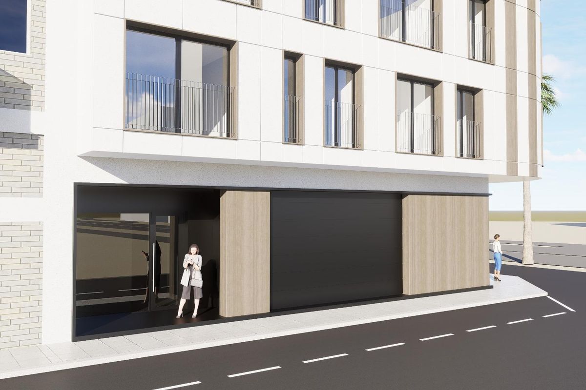 Entreezicht van het penthousegebouw in Torrevieja, met een stijlvolle moderne ingang.