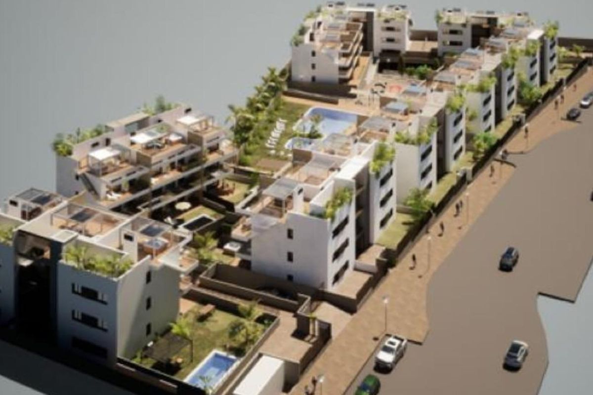 Luchtfoto die de indeling van de appartementen in Finestrat verkent, met nadruk op tuinen en recreatiegebieden.