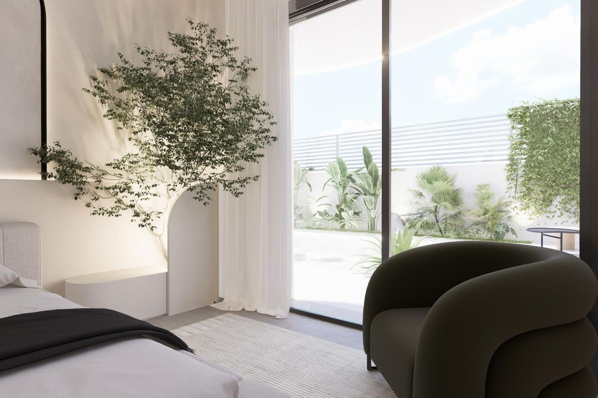 Uitnodigende slaapkamerhoek in een 3-slaapkamer villa, Rojales, met toegang tot een rustige tuin.