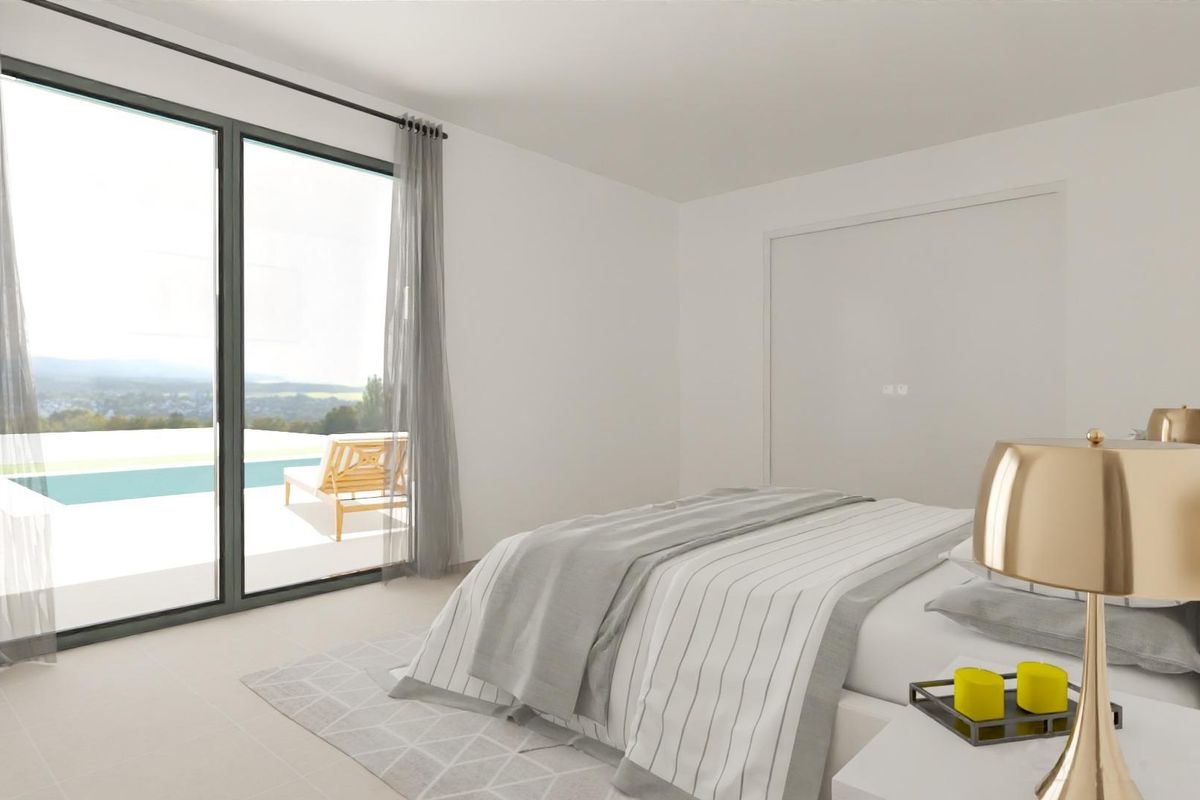 Bright master bedroom with terrace access and panoramic views in a villa in Monforte del Cid, Costa Blanca South.