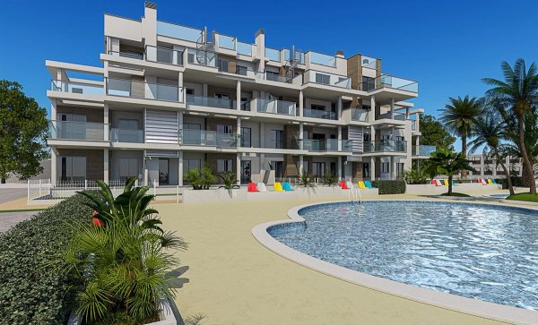 Buitenzicht op een moderne 3-slaapkamer penthouse in Denia met zwembad en tuinen onder een heldere blauwe lucht.
