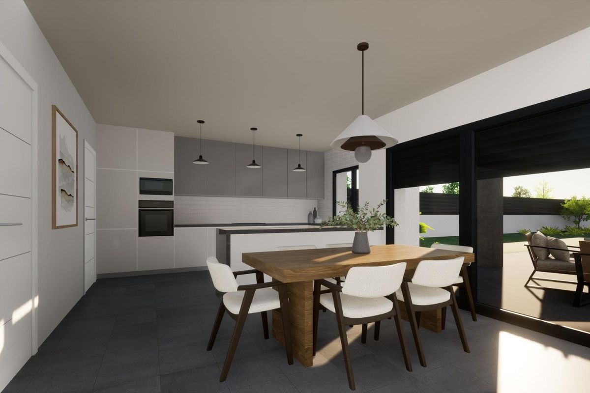 Modern kitchen in a Pinoso villa equipped with sleek appliances and a dining area for family meals.