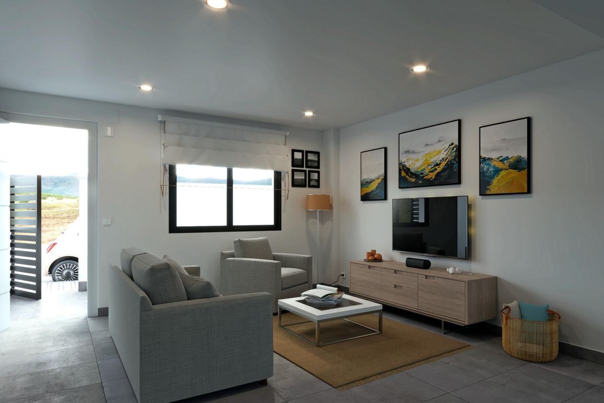Woonkamer van een 3-slaapkamer villa in Los Belones met moderne meubels en natuurlijk licht.