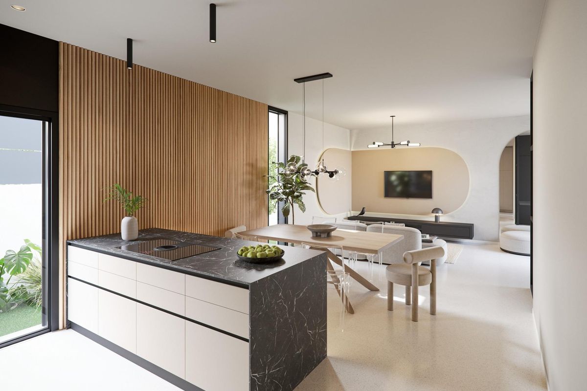 Moderne keuken en eetruimte in een villa in San Miguel de Salinas, met een strakke uitstraling en natuurlijk licht.