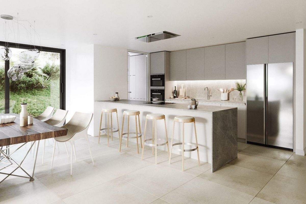 Contemporary keuken eiland en eetruimte in een 3-slaapkamer appartement, gelegen in Estepona, Costa del Sol.