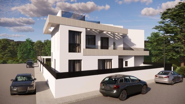Buitenkant van een moderne 3-slaapkamer townhouse in Rojales, Costa Blanca Zuid, met een heldere gevel.